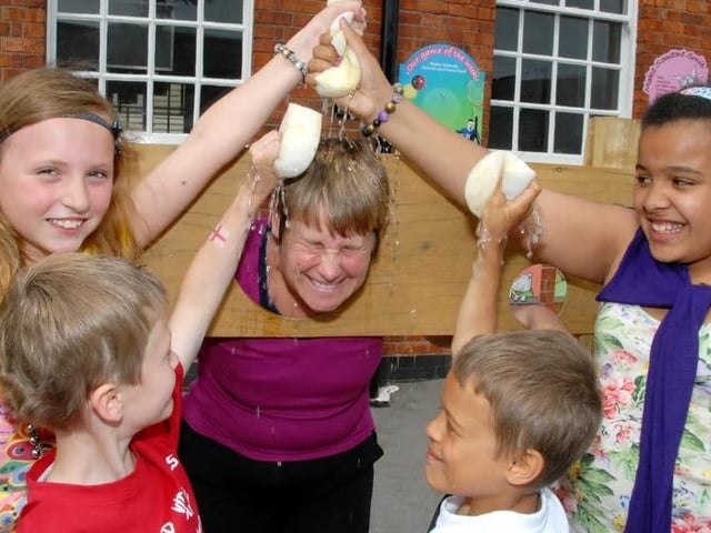Sutton's Croft School held its annual Summer Fair in 2010. Pictured is Jill Robinson, the Year 3 and 4 teacher, in the stocks while being sponged by students.