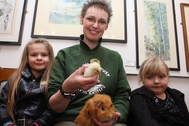 Amy Tatler, six, Farm guide Sarah Roberts and Stevie-Faye Lawson, six with some of the animals from white post farm