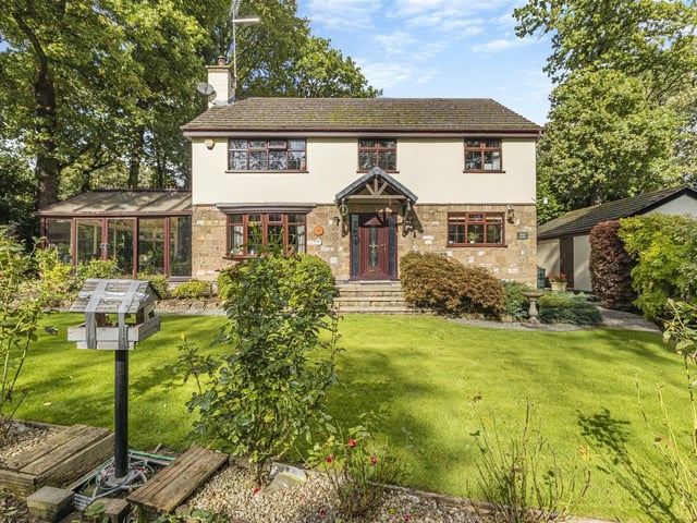 Step back for an impressive view of the handsome frontage of the Mansfield property, which sits close to The Hermitage nature reserve.