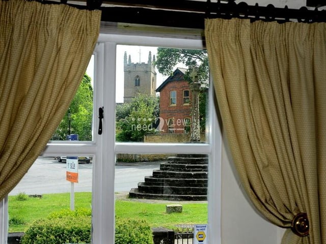 How about this for a view from one of the windows at Cosy Cottage? It sums up how the property is fully immersed in village life.