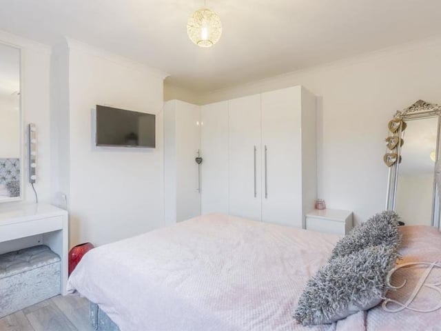 All four of the main bedrooms on the first floor at the Mansfield property are an excellent size. This photo reveals plenty of wardrobe space.