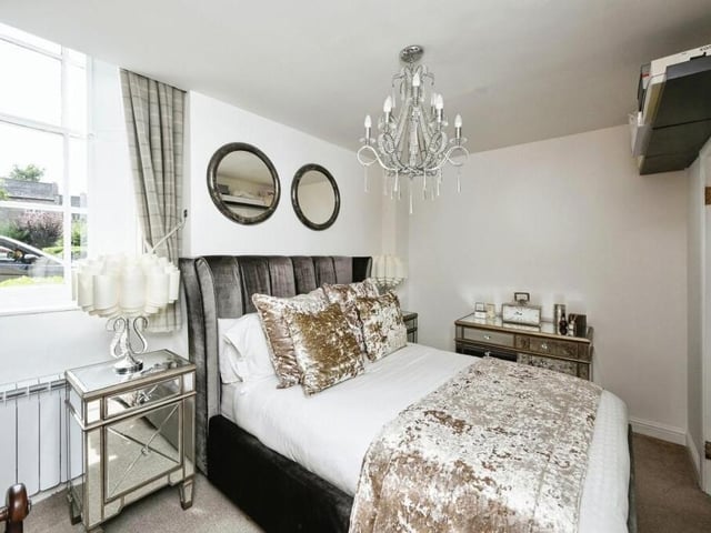 The beautiful double bedroom is a comfortable retreat, designed to provide privacy and relaxation. Its high-quality presentation makes it a serene haven.