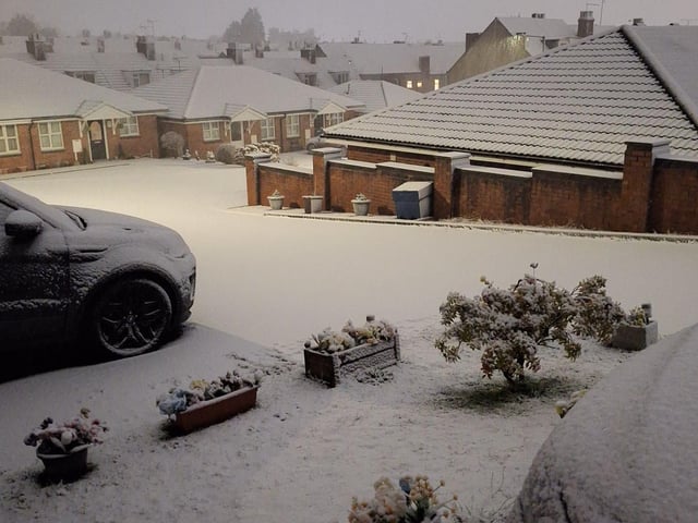 A snowy scene on Kitchener Drive in Mansfield.