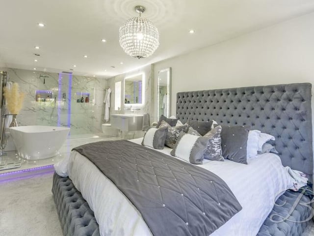 The master bedroom can only be described as superb, especially as it is attached to its own designer en suite bathroom, as you can see in the background,.
