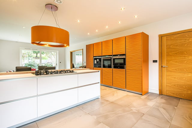 The property features an enormous, sleek kitchen/diner.