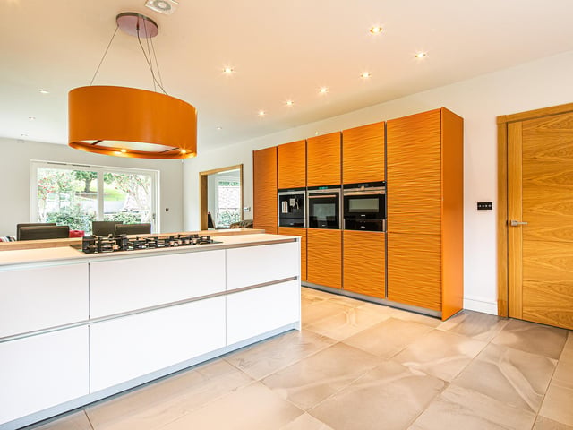 The property features an enormous, sleek kitchen/diner.
