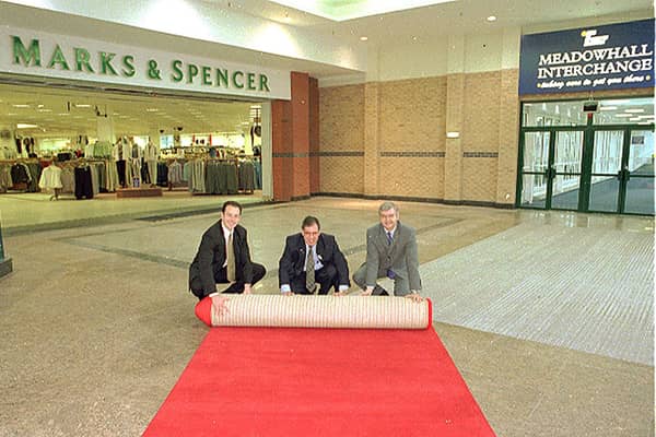 Marks & Spencer Meadowhall rolled out the red carpet for customers at the Meadowhall Centre for the opening of the new link between the Interchange bridge at the front of the store in 1999. Left to right, Darren Pearce, Finance Manager at Meadowhall Centre, Peter Walker, South Yorkshire Passenger Executive and Stefan Andrejczuk, M & S Meadowhall Store Manager.