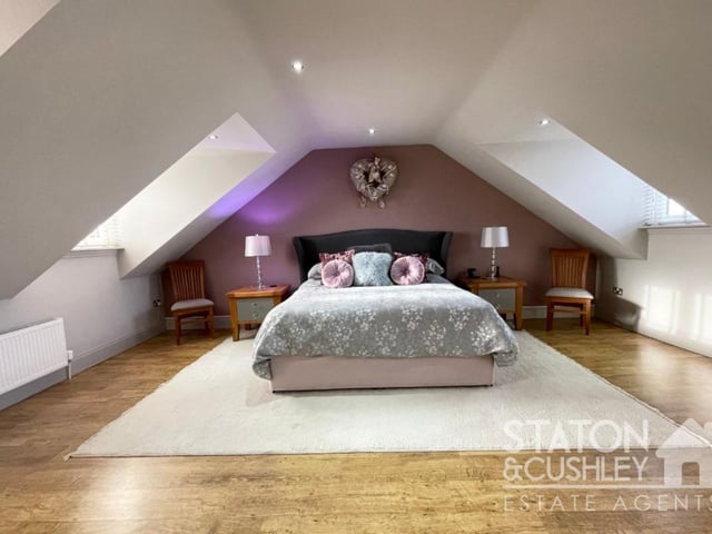 The principal, and largest, double bedroom on the first floor is a terrific, contemporary space, with windows facing front and back, LVT flooring and spotlights.