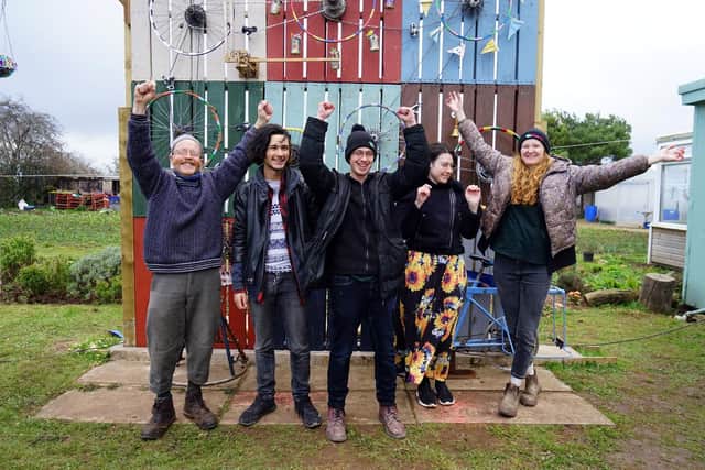 Ben Sofield is pictured alongside volunteers.