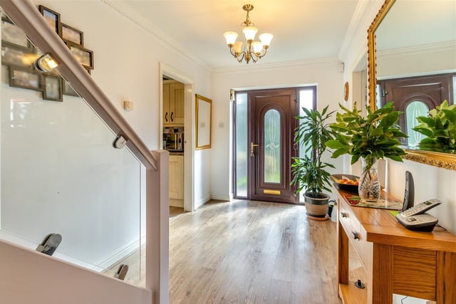 The inviting entrance hall screams "come on inside" and sets the tone for the rest of the £535,000 property. It has a high-quality vinyl floor, coving to the ceiling and an under-stairs storage cupboard.