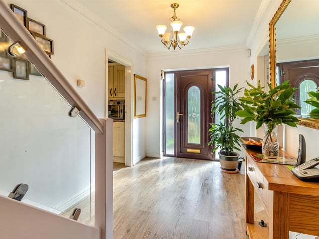 The inviting entrance hall screams "come on inside" and sets the tone for the rest of the £535,000 property. It has a high-quality vinyl floor, coving to the ceiling and an under-stairs storage cupboard.