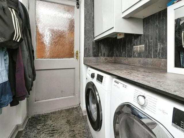 Just off the kitchen/diner is this convenient utility room, which has space for a washing machine and tumble dryer. It houses a wall-mounted boiler.