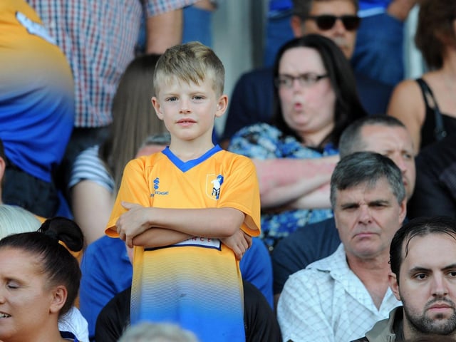Mansfield Town fans watch the 2-1 win over Sheffield Wednesday on 24 July 2018.