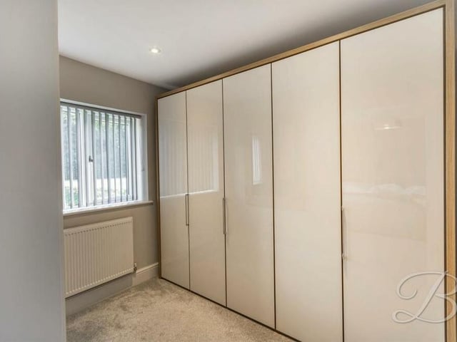 The master bedroom has access to this dressing room, which is a hidden luxury that creates the perfect space to stay organised.