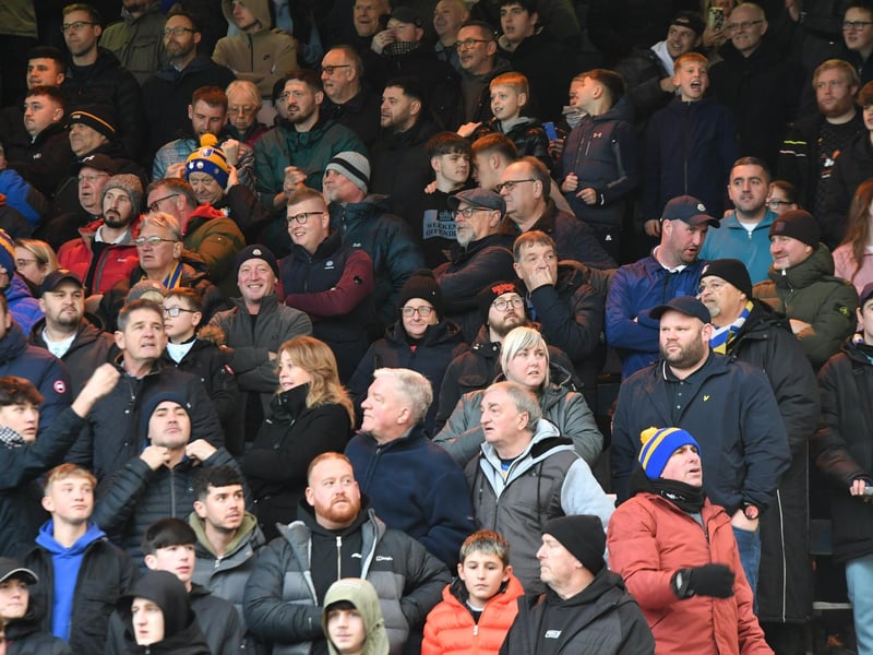 Mansfield Town fans watch the brilliant win at Peterborough United.