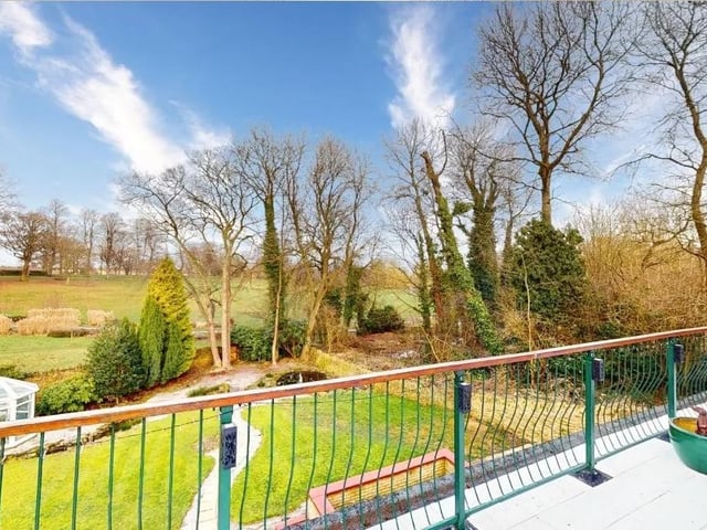 The lounge opens onto a substantial balcony area which offers delightful open views of the garden and beyond.