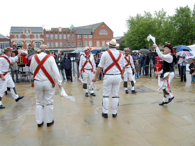 Morris Dancers entertained the people who braved the rain at Hucknall's Market reopening in 2007.