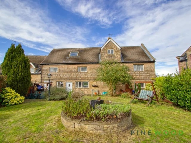 The beautifully established rear garden offers a private retreat
