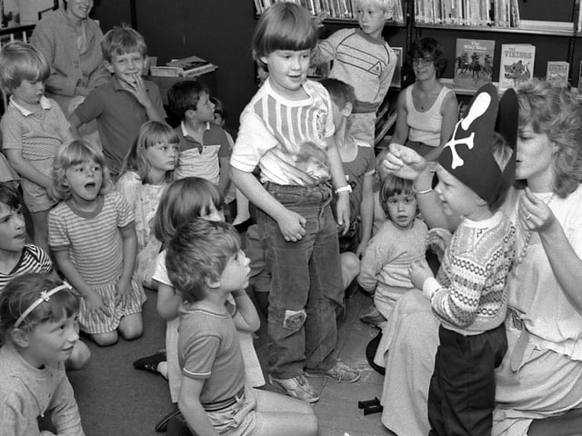 These Forest Town youngsters enjoy story time in 1986.
