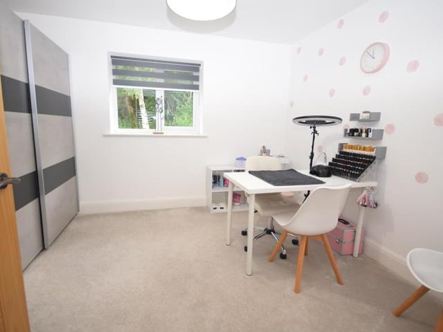 The fifth and final bedroom could easily be converted into an office for working from home. It has plenty of storage space too.