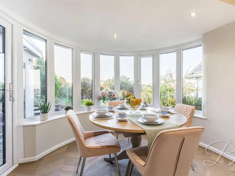 Ample furniture space with a bay window to the rear and an external door giving access to the garden.