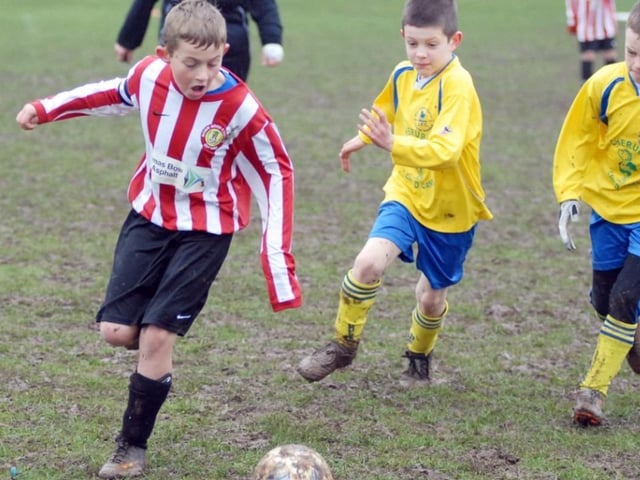 Robin Hood Colts (red and white stripes) v Woodhouse Colts U9s pictured at the Sherwood Fields ground in Edwinstowe in 2011