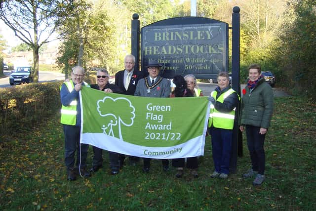 Volunteers raising the Green Flag at Brinsley Headstocks last year.