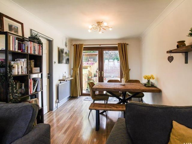 A second look at the living room/diner. Double-opening uPVC double-glazed patio doors lead out to the back garden.