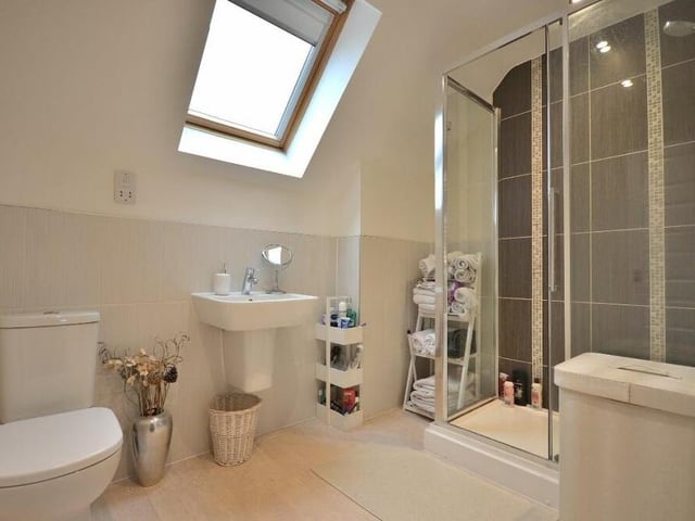 In keeping with the master bedroom, its en suite shower room is an excellent asset. Well presented, it includes a shower cubicle, wash hand basin and low-flush WC