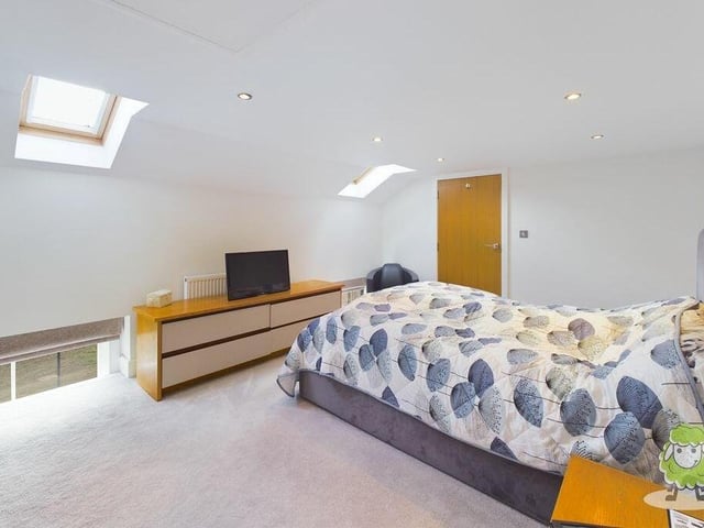 A second shot of the master bedroom, showing how bright and spacious it is.
