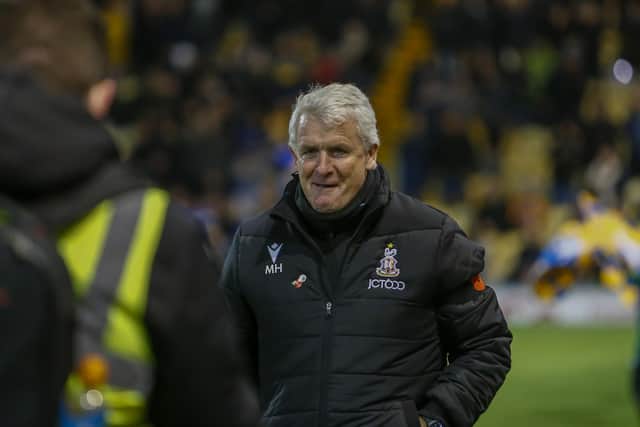 Bradford boss Mark Hughes at Mansfield in November.