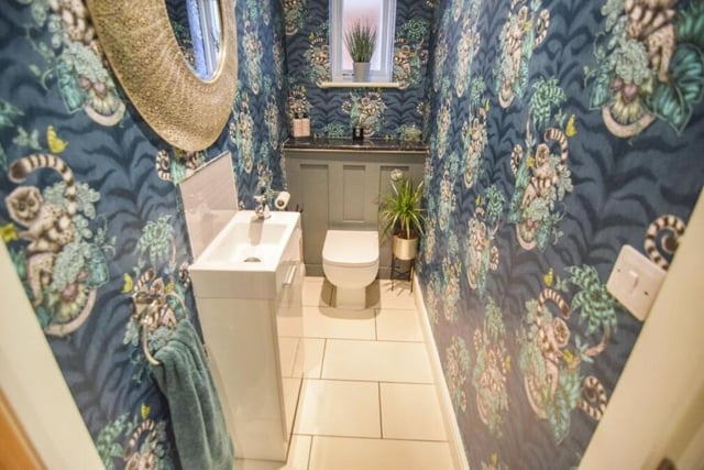 The ground floor of the £575,000 property includes this bonny and cheerful toilet, complete with WC and wash hand basin.