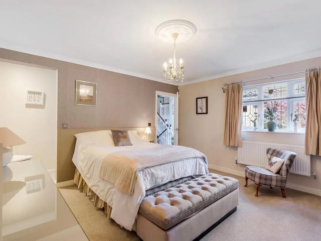 One of four spacious bedrooms