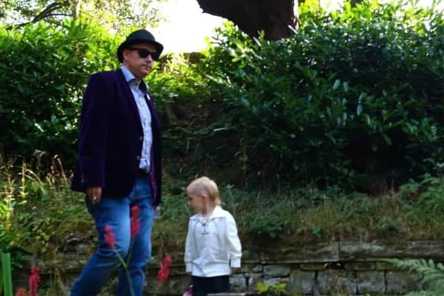 Dan pictured with his son, Lewis