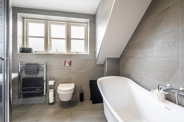 The property has four bathrooms in total, with Villeroy & Boch fittings and Porcelanosa tiling throughout.