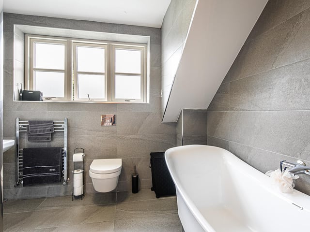The property has four bathrooms in total, with Villeroy & Boch fittings and Porcelanosa tiling throughout.