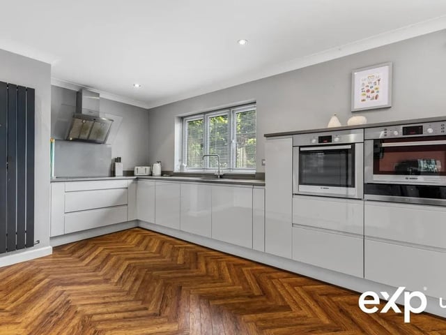 An on-trend open-plan kitchen / breakfast room is designed with handpicked first-class fittings, and everything is comprehensively styled to an exacting standard.