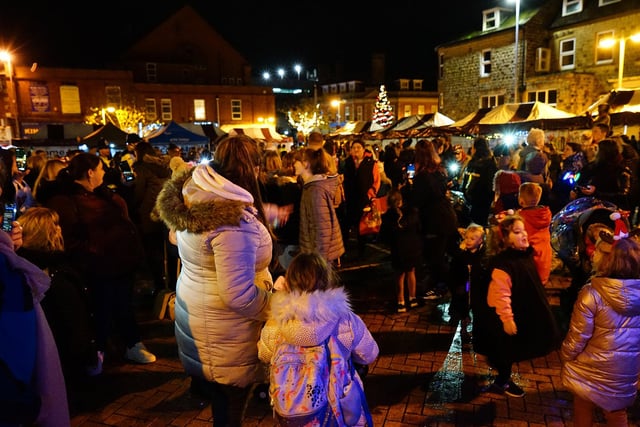 Crowds gathered in Sutton Square to see the lights being turned on for another year.