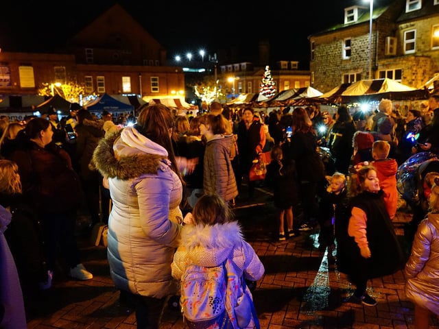 Crowds gathered in Sutton Square to see the lights being turned on for another year.