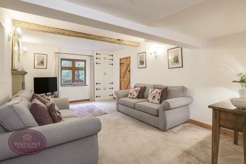 It's not hard to imagine relaxing nights in, watching TV, in the lounge, which also has a window facing the front of the house and a door to the inner hall.