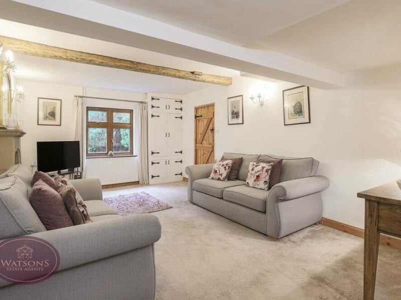 It's not hard to imagine relaxing nights in, watching TV, in the lounge, which also has a window facing the front of the house and a door to the inner hall.