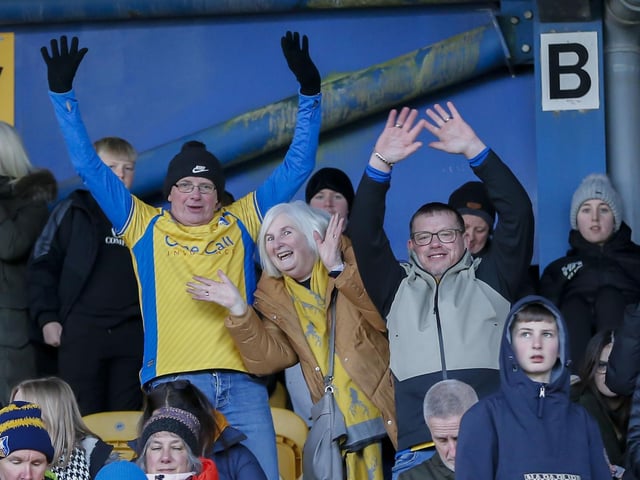 Mansfield fans prior to the Sky Bet League 2 match against Crewe Alexandra at the One Call Stadium, 06 Jan 2024, Photo credit Chris & Jeanette Holloway / The Bigger Picture.media:Mansfield Town fans watched their side beaten at home in the league for the first time this season.