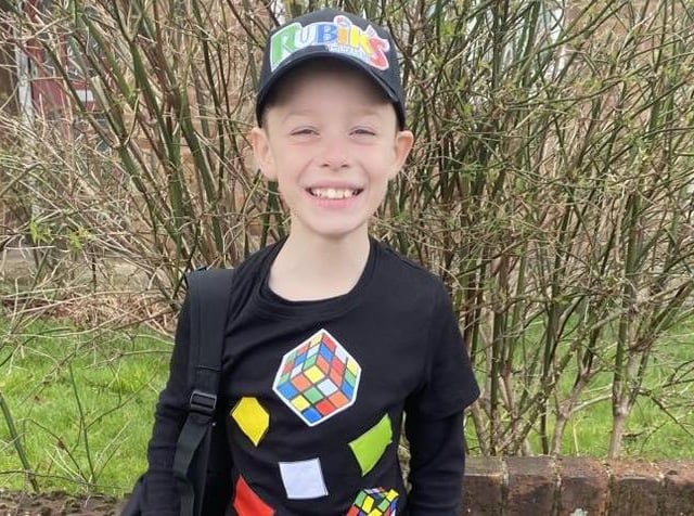 Karter Elton, 9, is dressed as a Rubik's Cube.