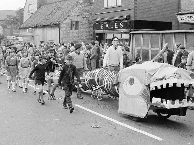 Spot any familiar faces in this carnival parade picture?
