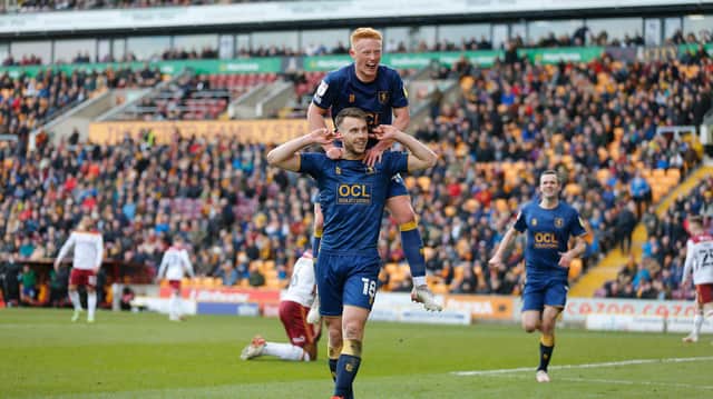 Mansfield Town forward Rhys Oates celebrates his first half goal with Matthew Longstaff during Stags' win against Bradford City.
