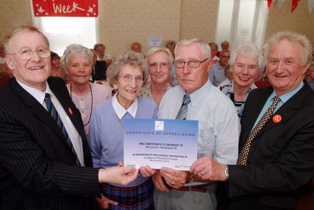 This one is from 2006. Mansfield Community Hospital volunteers receive long service awards as part of National Volunteer Week. Recognise anyone?