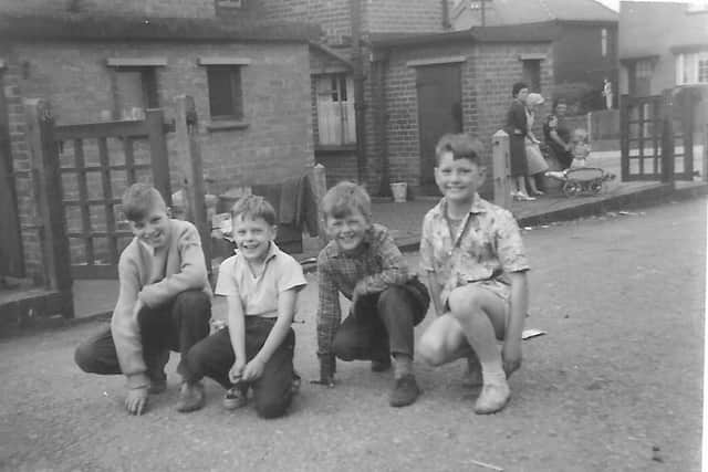 THEN - Steve Waring (second right) with mates (from left) Tony Varley, Billy Varnham and Dave Godson outside Brierley Cottages in Sutton in 1962.
