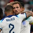 Kyle Walker consoles skipper Harry Kane after Saturday's defeat by France.