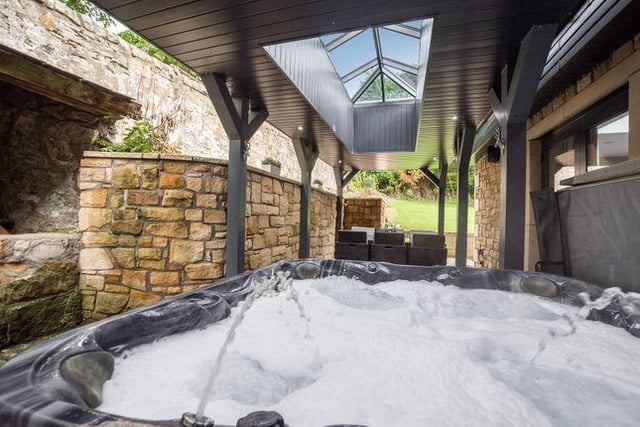 The property was extended to the side and rear a couple of years ago, with a side extension and a large covered pergola style building which is home to the hot tub and stone built kitchen area/pizza oven
