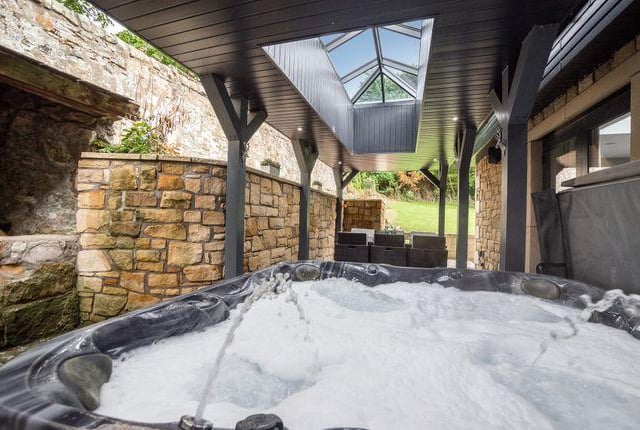 The property was extended to the side and rear a couple of years ago, with a side extension and a large covered pergola style building which is home to the hot tub and stone built kitchen area/pizza oven